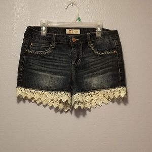 shorts with lace design at the bottom